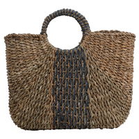 Beige wicker bag with blue round handle product image