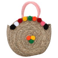 Beige wicker bag round colored circles with pink hand product image