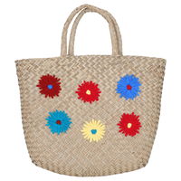 Beige wicker bag with colorful patterns in hand product image