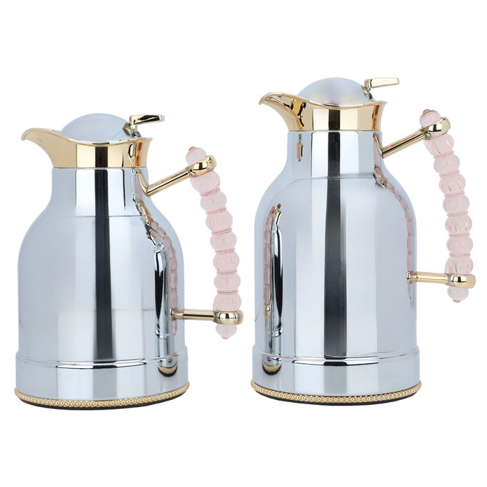 A unique thermos set of silver with a light pink gold handle, two pieces image 1