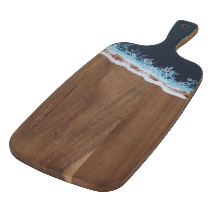 A rectangular dessert serving board with a sea wave pattern on its hand image 2