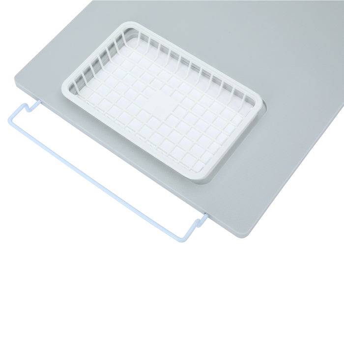 Grey plastic cutting board with strainer with hand image 4